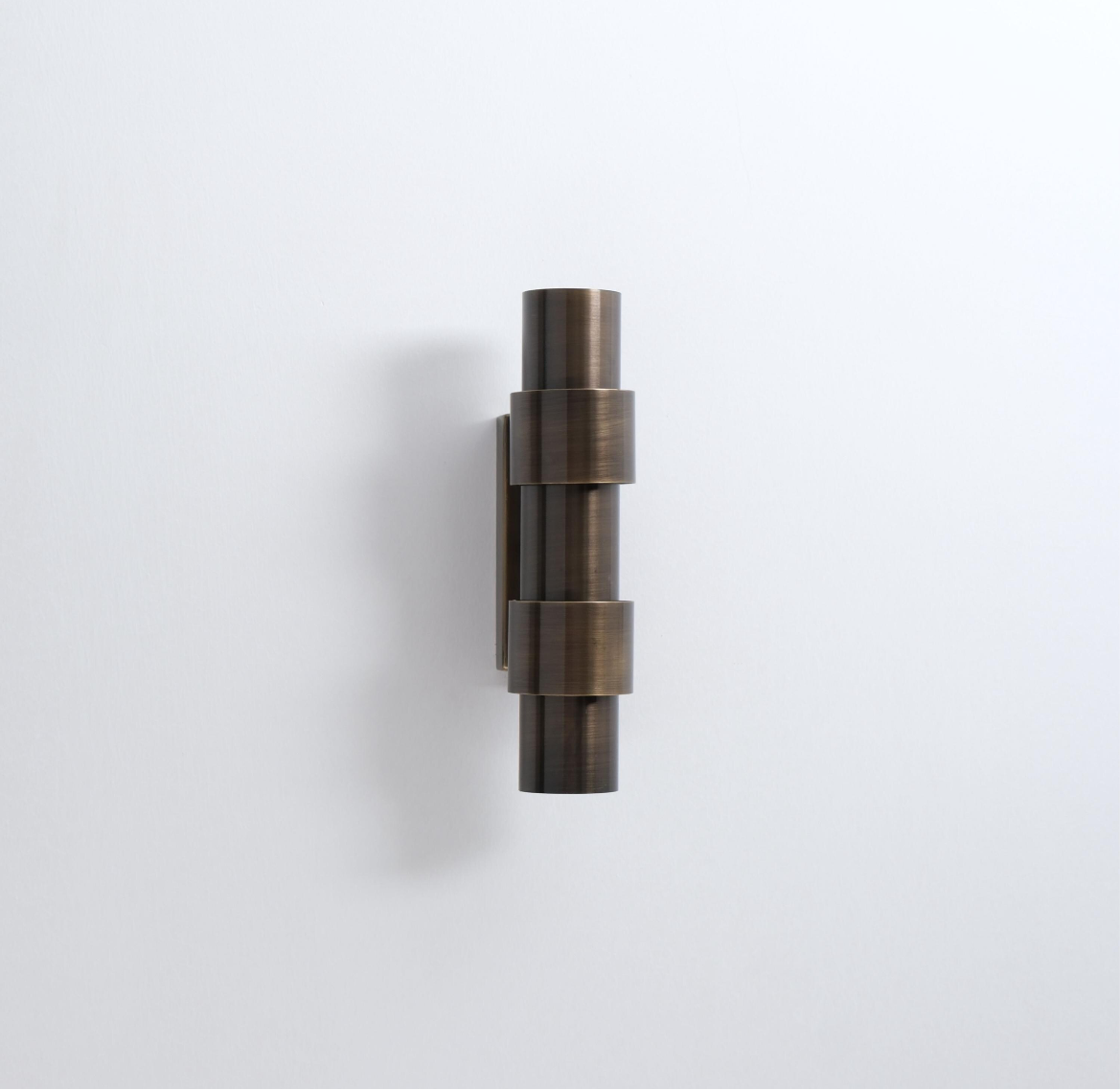 The Lighting Agency - Handmade Caldera Brass Wall Light